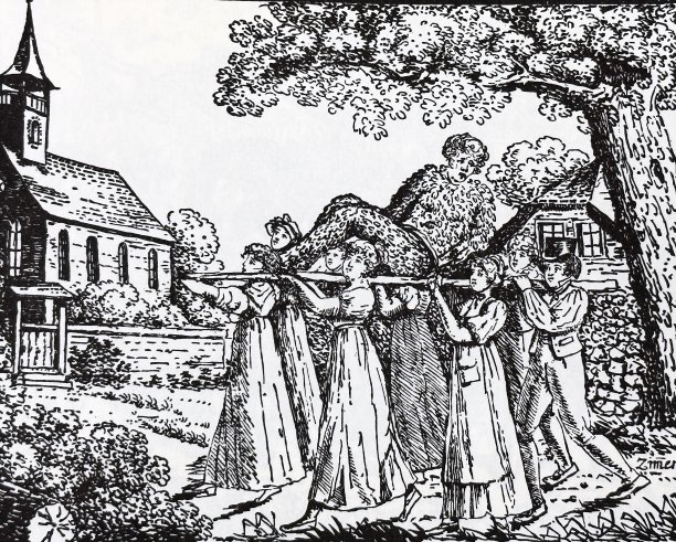 在邻村结婚的新郎，要涂上柏油，涂上羽毛，由村里的姑娘抬着穿过村子图片下载