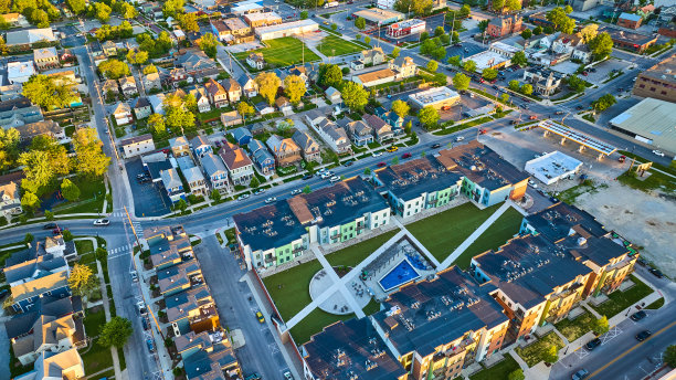 金色光晕日出房屋商业街景城市景观航拍酒店泳池图片下载