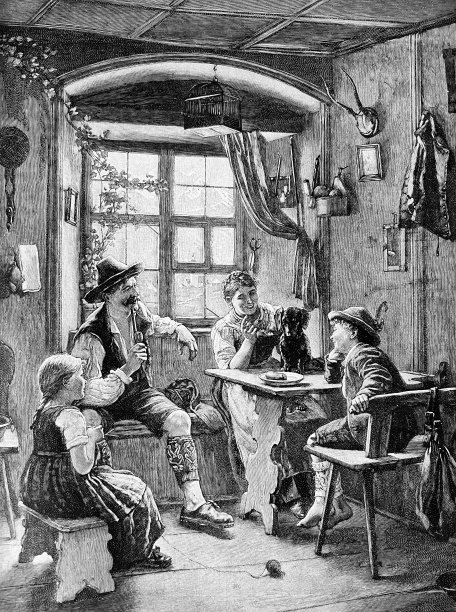 腊肠狗坐在客厅的桌子上，面前放着一盘香肠图片下载