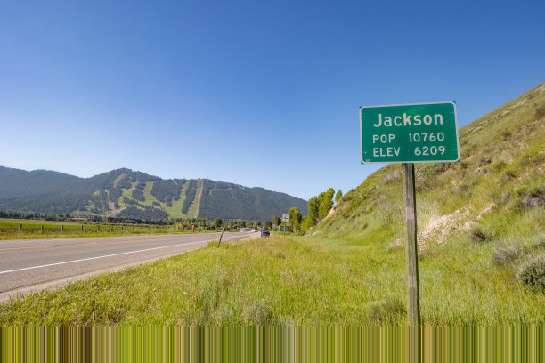 怀俄明州提顿县杰克逊霍尔的杰克逊入口标志图片下载