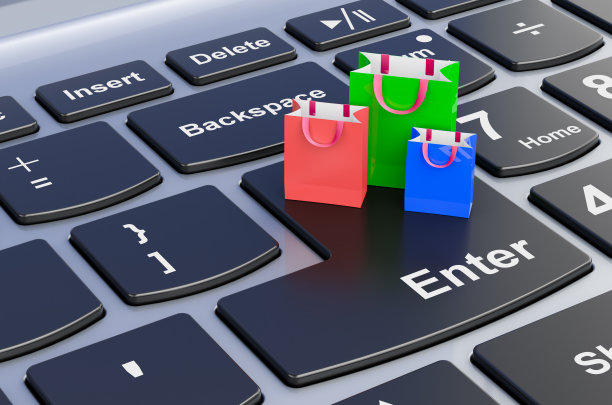 笔记本电脑键盘上的购物袋，3D渲染图片下载