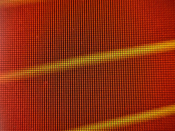 屏幕上的红色和黄色像素。图片下载