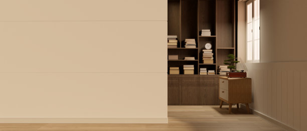 舒适的家庭客厅，抽屉里有唱机，大书架，和白色的墙。图片下载