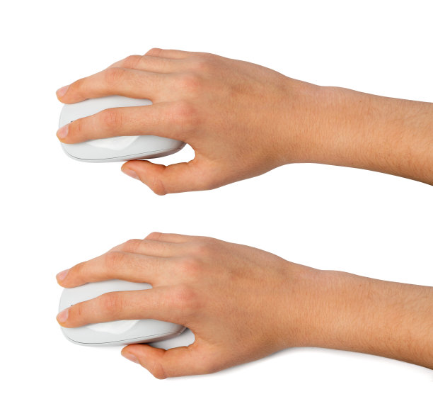 使用电脑鼠标特写，点击概念，无线技术，手在电脑鼠标上图片下载