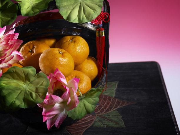 一篮荷花柑桔图片下载