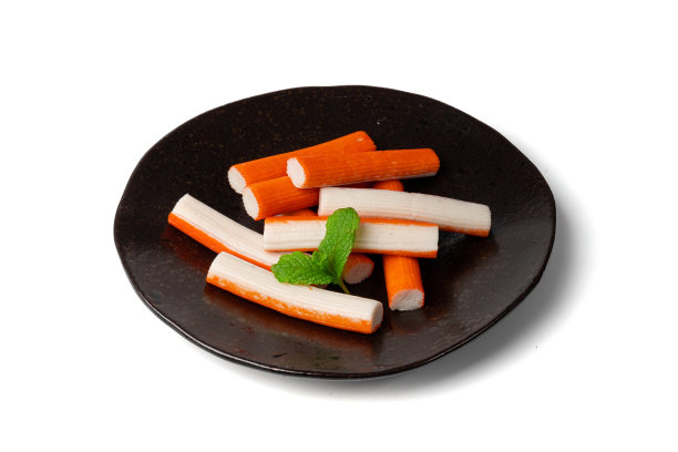 采购产品蟹棒孤立，橙色蟹棒特写，蟹肉食品，蟹肉鱼棒，蟹棒图片下载