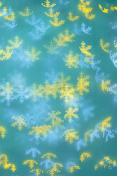 圣诞节或新年的抽象魔术灯背景，雪花在海蓝宝石上散景为寒假背景。圣诞美学照片，模糊效果，庆祝照明图片下载