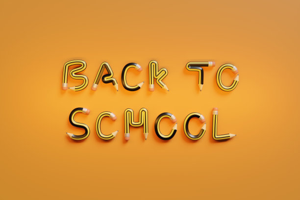 文字“回到学校”与石墨铅笔隔离在橙色背景。3 d演示。图片下载