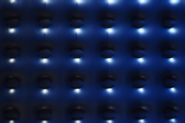 抽象的背景在深蓝色与明亮的发光点。重复模式图片下载