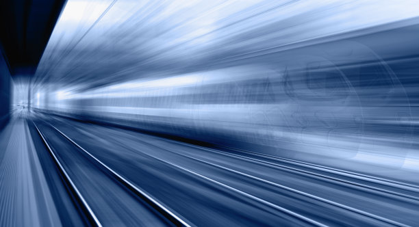 ▽在铁轨上行驶的蓝色高速列车=列车行驶速度过快的原因是前部的空气压力产生了过多的热量图片下载