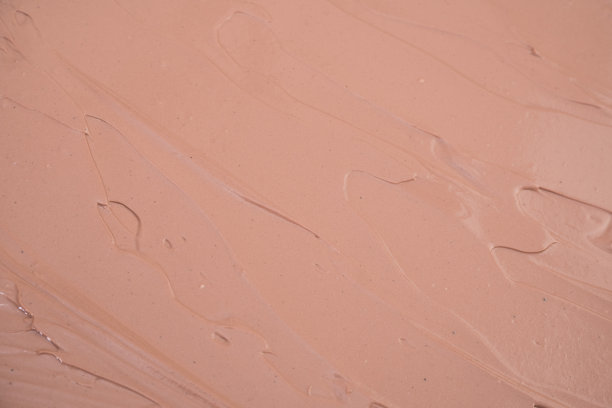 粉底霜模糊，红土面膜质地。背景图片下载