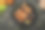 黑色木桌上的烤肉串和烧烤酱。前视图。图片下载