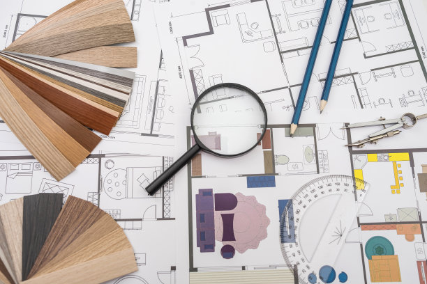 房屋设计图上的颜料色板与绘图工具图片下载