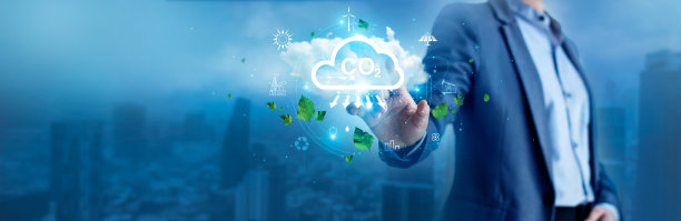 商人触摸二氧化碳的图标描绘问题和减少二氧化碳的排放对企业工作的影响。全球变暖和气候变化。节能减排，可持续发展。地球日图片下载