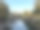 从意大利威尼斯丽都的四喷泉桥(Ponte delle Quattro Fontane)上看运河的特写图片，色彩缤纷的建筑，系泊的船只，湛蓝晴朗的天空，逐渐缩小的视角图片下载