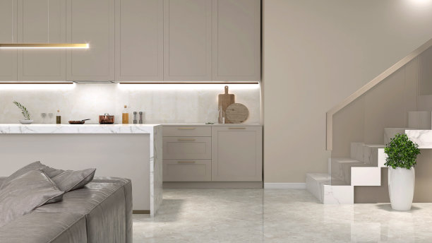 现代白色大理石顶部餐桌岛，沙发，橱柜柜台，橱柜，悬臂楼梯，钢化玻璃板栏杆，棕色扶手在厨房和客厅图片下载