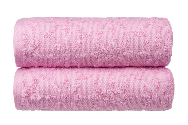 五颜六色的毛巾，卷起来堆放在桌子上图片下载