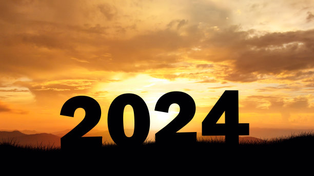 2024年的新年在惊人的日落。新年概念。象征着2024年的开始和迎接。创造力。轮廓。图片下载