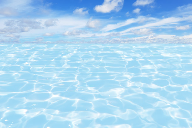 散焦模糊透明的蓝色大海和天空。水面纹理与飞溅和泡沫。新潮抽象的自然背景。水波在阳光下与复制空间。Bluewater灿烂。图片下载