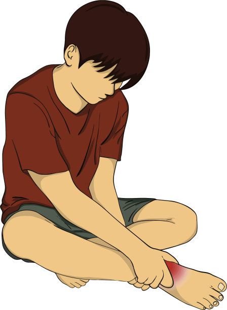 一个人在运动时扭伤了脚踝图片下载