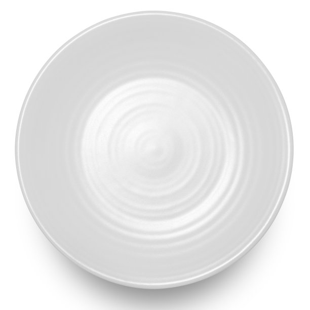 白色背景上隔离的白圆陶瓷板。图片下载