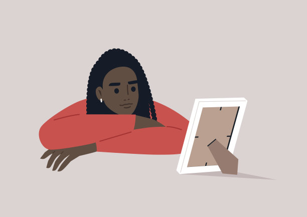 一个年轻的人物凝视着白色相框里的照片，沉浸在怀旧的遐想中图片下载