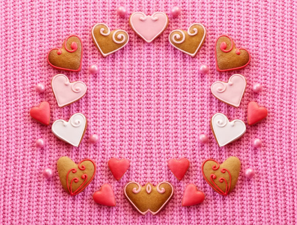 粉色爱心饼干背景，爱意概念图图片下载