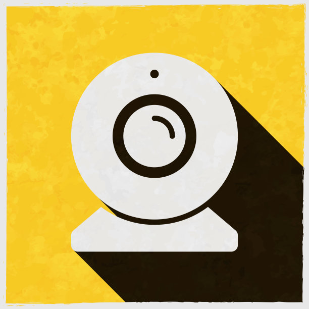 摄像头。图标与长阴影的纹理黄色背景图片下载