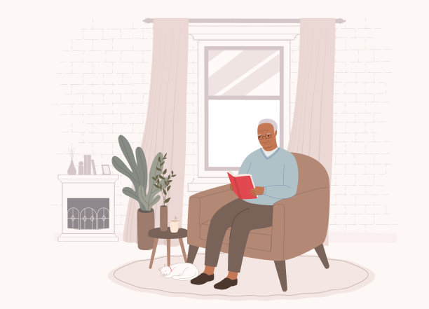 黑人老人坐在沙发上在家看书。图片下载