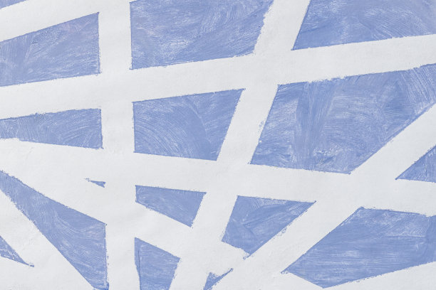 蓝色和白色对角粉刷的墙面。墙体的图形质感。抽象的几何背景图片下载