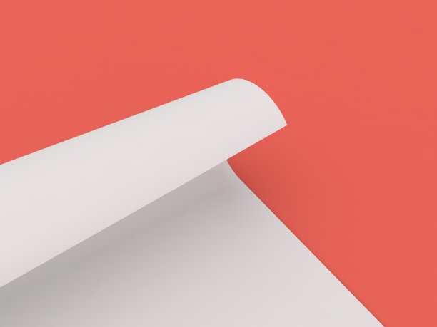 在红色近距离背景上的卷曲纸张。图片下载