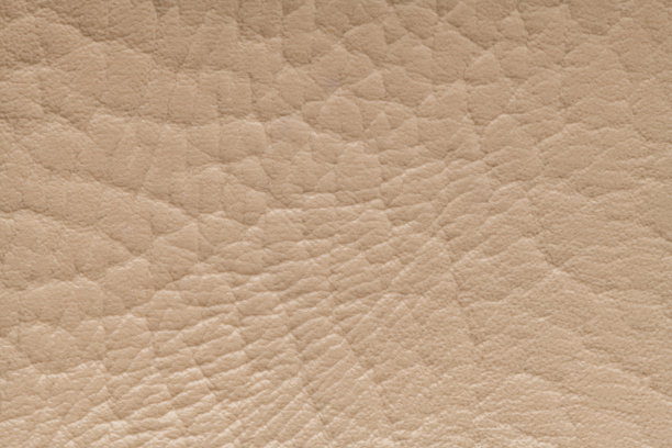 米色人造革，纹理大。人造皮肤。特写镜头。背景。纹理。图片下载