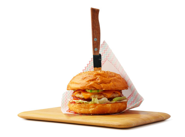 美味的汉堡在木板上孤立的白色背景图片下载