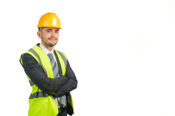 穿西装的男人，穿着高能见度的背心和安全帽图片下载