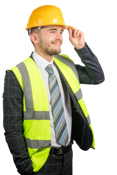 穿西装的男人，穿着高能见度的背心和安全帽图片下载