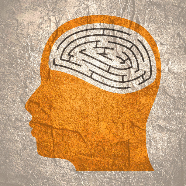 一个男人的头部侧面有一个圆形迷宫，象征着一个人的抑郁状态。心理上的帮助。人格障碍和抑郁症。图片下载