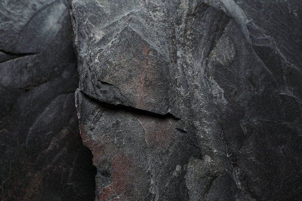 黑色覆面石头的背景图片下载