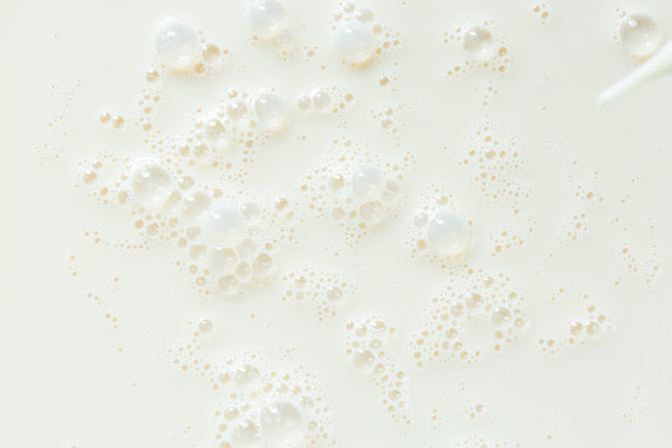 宏观牛奶纹理，高分辨率美丽的天然牛奶飞溅可以作为背景。图片下载