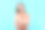 年轻女子的肖像与美丽的乳房在浅蓝色的背景图片下载