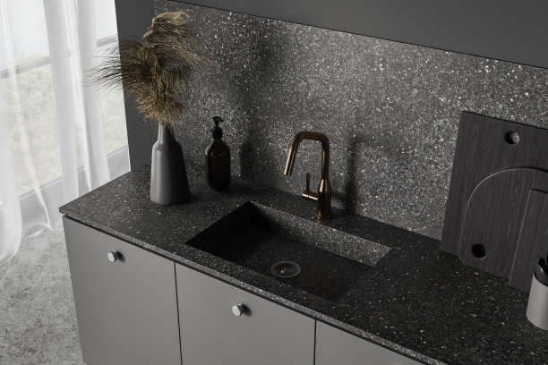 灰色现代厨房内部的俯视图，配有烹饪区和厨具图片下载