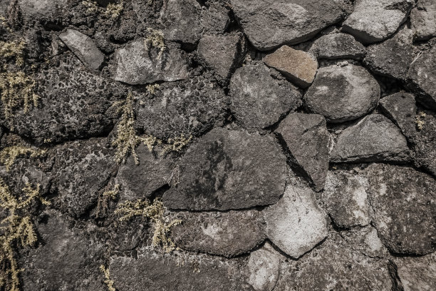 老化风化的铺路砖和混凝土砖的纹理。古老的城堡石墙。图案灰黄褪色，颜色现代风格设计，装饰凹凸不平，墙面用水泥开裂的真石。砖纹理壁纸或背景。图片下载