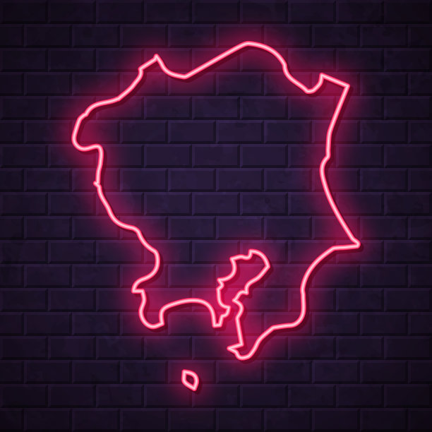 关东地图-发光的霓虹灯在砖墙的背景图片下载