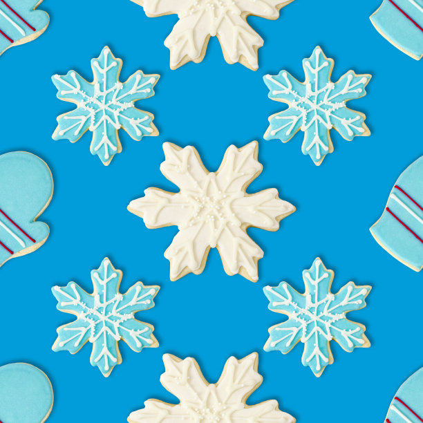 手套，蓝色和白色雪花:圣诞饼干重复图案背景墙纸图片下载