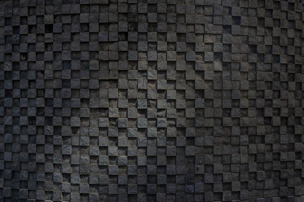 灯光照在石砌的艺术背景墙上图片下载