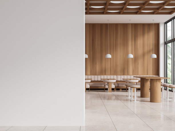 时尚的咖啡厅内部设有座椅和窗户，用餐区和桌子。模型墙图片下载