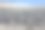 海岸线上覆盖着光滑的灰色巨石图片下载