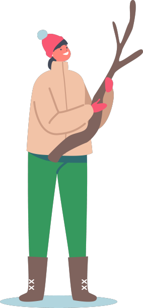 快乐的小女孩穿着暖和的衣服抱着树枝图片下载