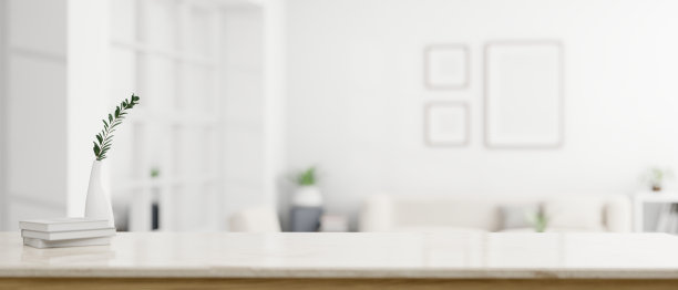 一个现代的白色工作区，在模糊的现代白色客厅上有复制空间图片下载