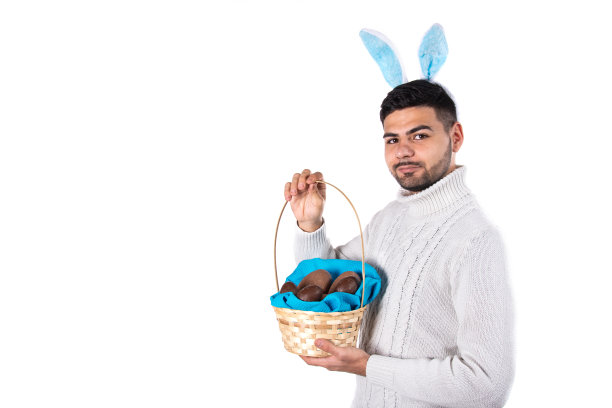 年轻迷人的学生在复活节打扮成兔子。图片下载