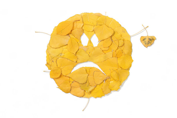 悲伤的脸由黄色制成图片下载